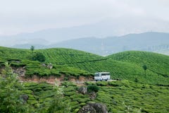 En bussbortgång till och med Munnar tekolonier royaltyfri foto En bussbortgång till och med Munnar tekolonier royaltyfri foto