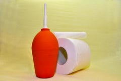 Enema rojo del equipamiento médico y producto de higiene relacionado fotografía de archivo libre de regalías Enema rojo del equipamiento médico y producto de higiene relacionado fotografía de archivo libre de regalías