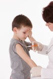 Enfant avec l'injection photo stock Enfant avec l'injection photo stock