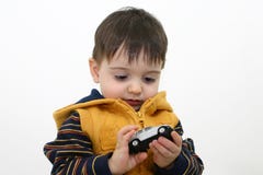Enfant de garçon dans des vêtements d'automne images stock Enfant de garçon dans des vêtements d'automne images stock