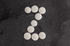 English alphabet lined with white chocolate stock photos English alphabet lined with white chocolate stock photos