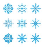 Ensemble de différents flocons de neige d'isolement sur le fond blanc Images stock Ensemble de différents flocons de neige d'isolement sur le fond blanc Images stock