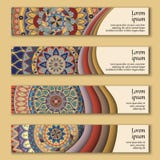 Ensemble ethnique ornemental coloré de bannière Calibres avec les éléments onduleux et le mandala tribal Photographie stock libre de droits Ensemble ethnique ornemental coloré de bannière Calibres avec les éléments onduleux et le mandala tribal Photographie stock libre de droits