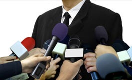 Entrevistas da imprensa dos meios com repórteres imagem de stock Entrevistas da imprensa dos meios com repórteres imagem de stock