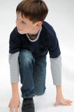 Entzückender Junge mit vielen Sommersprossen Lizenzfreie Stockfotografie Entzückender Junge mit vielen Sommersprossen Lizenzfreie Stockfotografie