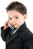 Entzückendes Baby in der Klage auf Mobiltelefon lizenzfreie stockfotos Entzückendes Baby in der Klage auf Mobiltelefon lizenzfreie stockfotos