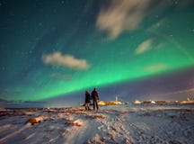 Northern Lights in the mountains of Reine, Norway. Lofoten Islands stock image Northern Lights in the mountains of Reine, Norway. Lofoten Islands stock image