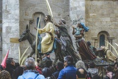 Equitação de Jesus Christ em um asno na semana de domingo de palma easter Típico da Páscoa, a Semana Santa na Espanha A Semana Sa fotografia de stock royalty free Equitação de Jesus Christ em um asno na semana de domingo de palma easter Típico da Páscoa, a Semana Santa na Espanha A Semana Sa fotografia de stock royalty free