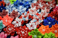 Erasers for hair from ribbons. Bright decoration for hair of han royalty free stock image Erasers for hair from ribbons. Bright decoration for hair of han royalty free stock image