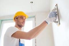 Erbauer, der zuhause mit Schleifwerkzeug arbeitet stockbilder Erbauer, der zuhause mit Schleifwerkzeug arbeitet stockbilder