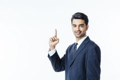 Erfolgreicher Unternehmergeschäftsmann, der oben zeigt lizenzfreies stockfoto Erfolgreicher Unternehmergeschäftsmann, der oben zeigt lizenzfreies stockfoto