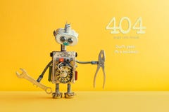 404 error page not found concept. Don`t panic I`m a mechanic. Hand wrench pliers robot handyman on yellow background stock photography 404 error page not found concept. Don`t panic I`m a mechanic. Hand wrench pliers robot handyman on yellow background stock photography
