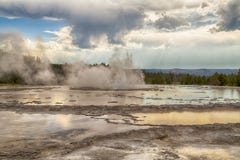Erupting Great Fountain Geyser in Yellowstone National Park, Wyoming, USA