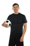 Esfera de futebol latino-americano da terra arrendada do homem fotos de stock royalty free Esfera de futebol latino-americano da terra arrendada do homem fotos de stock royalty free
