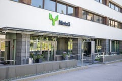 Main entrance to Metso Group headquarter in summer day