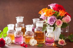 Essential oil and rose flowers aromatherapy spa perfumery Stock Image Essential oil and rose flowers aromatherapy spa perfumery Stock Image