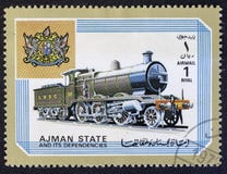 ESTADO AJMAN - CERCA DE 1972: locomotiva, série, cerca de 1972 imagens de stock royalty free ESTADO AJMAN - CERCA DE 1972: locomotiva, série, cerca de 1972 imagens de stock royalty free