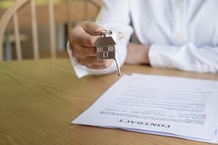Estate agent handing over house keys royalty free stock image Estate agent handing over house keys royalty free stock image