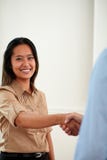 Ethnic young businesswoman giving hands greeting stock image Ethnic young businesswoman giving hands greeting stock image