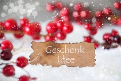 A etiqueta queimada, neve, flocos de neve, Geschenk Idee significa a ideia do presente Imagem de Stock Royalty Free A etiqueta queimada, neve, flocos de neve, Geschenk Idee significa a ideia do presente Imagem de Stock Royalty Free