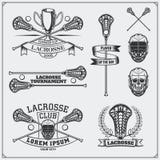 Etiquetas do clube da lacrosse, emblemas e elementos do projeto ilustração royalty free Etiquetas do clube da lacrosse, emblemas e elementos do projeto ilustração royalty free