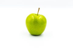 Ett gr?nt ?pple p? en vit bakgrund arkivfoto Ett gr?nt ?pple p? en vit bakgrund arkivfoto