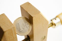 Euro Coin Under Pressure Stock Photo Euro Coin Under Pressure Stock Photo