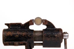EURO In The Grip Of Economic Crisis Royalty Free Stock Photography EURO In The Grip Of Economic Crisis Royalty Free Stock Photography