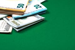 Euro notes and dollar bills on green background royalty free stock images Euro notes and dollar bills on green background royalty free stock images