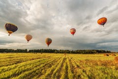 Evening flight of the hot air balloons Royalty Free Stock Images Evening flight of the hot air balloons Royalty Free Stock Images