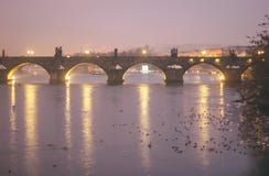 Evening in prague charles bridge lights on water royalty free stock images Evening in prague charles bridge lights on water royalty free stock images