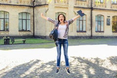 Exam Achievement Good Luch Education College Building Concept. Happy Excited Jumping Female Student Triumphing And Celebrating. Ex Royalty Free Stock Photo
