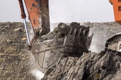 Excavating Rock Stock Photo