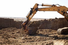 Excavator Working On The Excavation Stock Photo