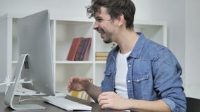 Excited Creative Man Cheering Win at Work stock video Excited Creative Man Cheering Win at Work stock video