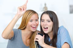 Excited friends listening music and singing stock photos Excited friends listening music and singing stock photos
