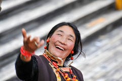 An exciting Tibetan woman,Tibet, China royalty free stock images An exciting Tibetan woman,Tibet, China royalty free stock images