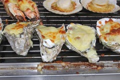 Exclusive Grilled Oysters And Gambas With Cheese, Asia Royalty Free Stock Photo Exclusive Grilled Oysters And Gambas With Cheese, Asia Royalty Free Stock Photo