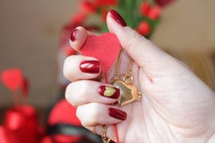 Exclusive manicure and composition for Valentine`s day. stock image Exclusive manicure and composition for Valentine`s day. stock image