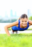 Exercise woman - push ups workout stock photography Exercise woman - push ups workout stock photography