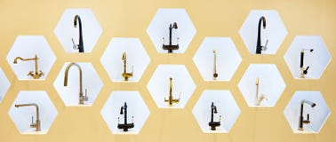 Exhibition of kitchen taps in store royalty free stock photography Exhibition of kitchen taps in store royalty free stock photography