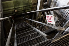 Exit Sign on Staircase in Abandoned Power Plant - New York stock photography Exit Sign on Staircase in Abandoned Power Plant - New York stock photography