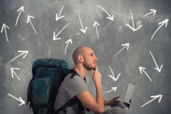 Explorer plans a new travel with his laptop royalty free stock image Explorer plans a new travel with his laptop royalty free stock image