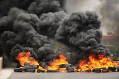 Explosion and burning wheels causing huge dark smo