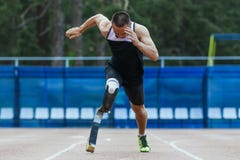 Explosive start of athlete with handicap royalty free stock images Explosive start of athlete with handicap royalty free stock images