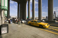 Exterior view of yellow taxi cab in front of the 30th Street Station, a national Register of Historic Places, AMTRAK Train Statio. N in Philadelphia, PA Royalty Free Stock Photography Exterior view of yellow taxi cab in front of the 30th Street Station, a national Register of Historic Places, AMTRAK Train Statio. N in Philadelphia, PA Royalty Free Stock Photography