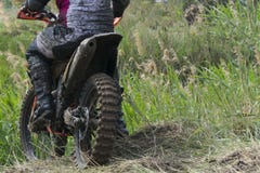Extreme sports on motorcycles. A rider on a motorcycle rides the sand. stock image Extreme sports on motorcycles. A rider on a motorcycle rides the sand. stock image