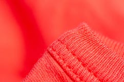 Fabric warm red orange sweater textile material texture stock photo Fabric warm red orange sweater textile material texture stock photo