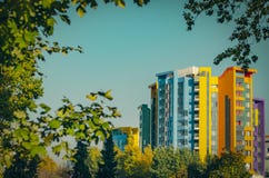 The facade of a multi-storey multi-colored building on the backg royalty free stock photo The facade of a multi-storey multi-colored building on the backg royalty free stock photo