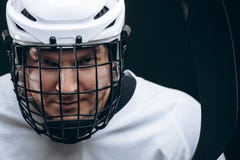 Portrait of sportsman in hockey uniform over black background royalty free stock photography Portrait of sportsman in hockey uniform over black background royalty free stock photography
